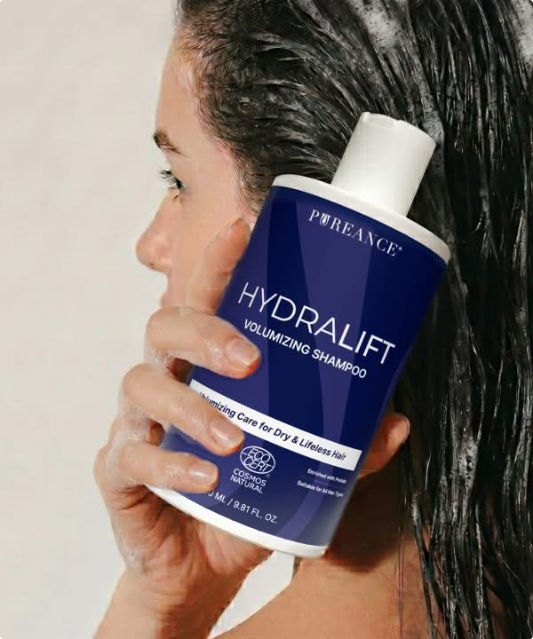 Applying HydraLift shampoo to wet hair