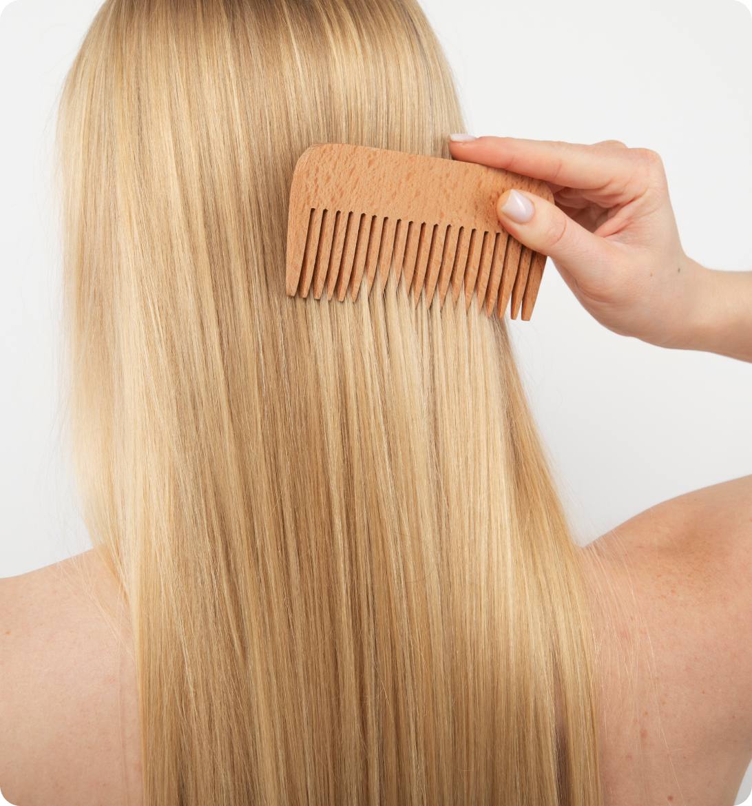 woman brushing her hair